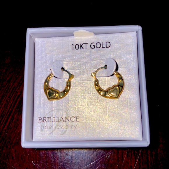 Girls 10 karat gold earrings never worn or taken out of box